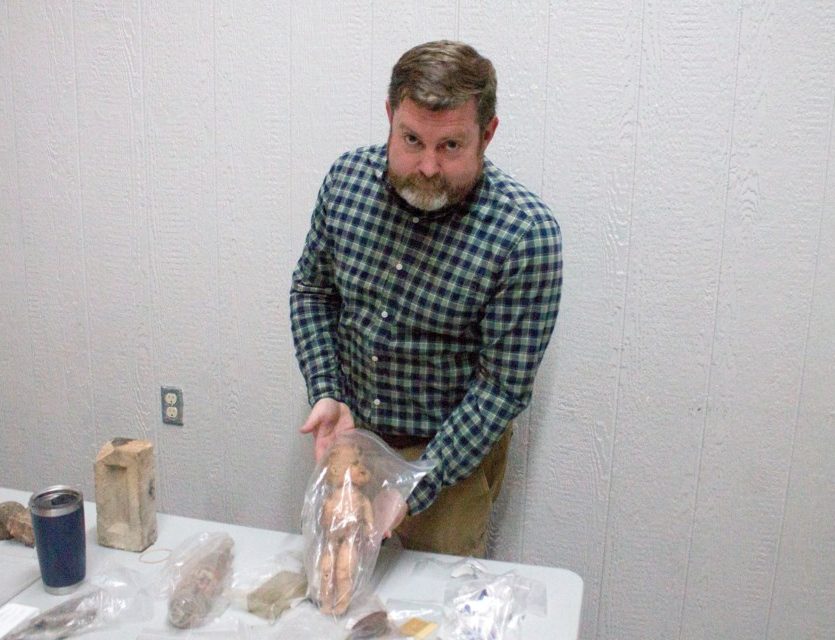 Senior project archaeologist, Sean Pickering, shows off an artifact that was found during the Highway 1A and Highway 22 archaeological survey